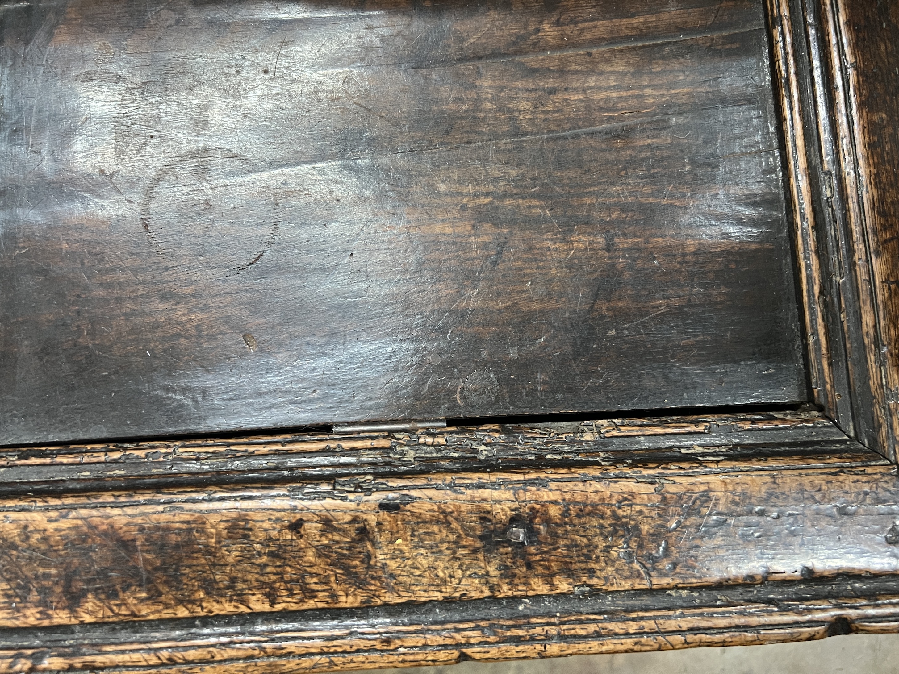 A late 17th / early 18th century panelled oak coffer, width 125cm, depth 50cm, height 50cm